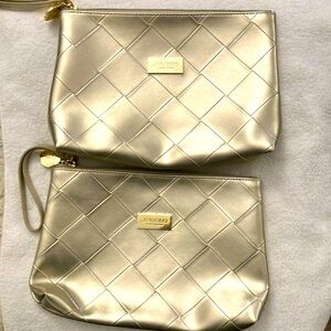 NEW! gold Shisedo Ginza Tokyo wristlet bag. Can be worn as a purse/cosmetics